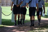 Picture of schoolboys' legs