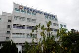 Foxconn building is shown, with logo in view. 