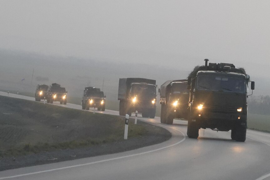A convoy of Russian military vehicles is seen as the vehicles move towards border in Donbas region of eastern Ukraine.