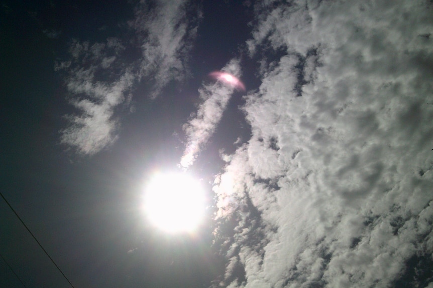An image of the sun and some clouds, taken by a participate in the Name.Narrate.Navigate program.
