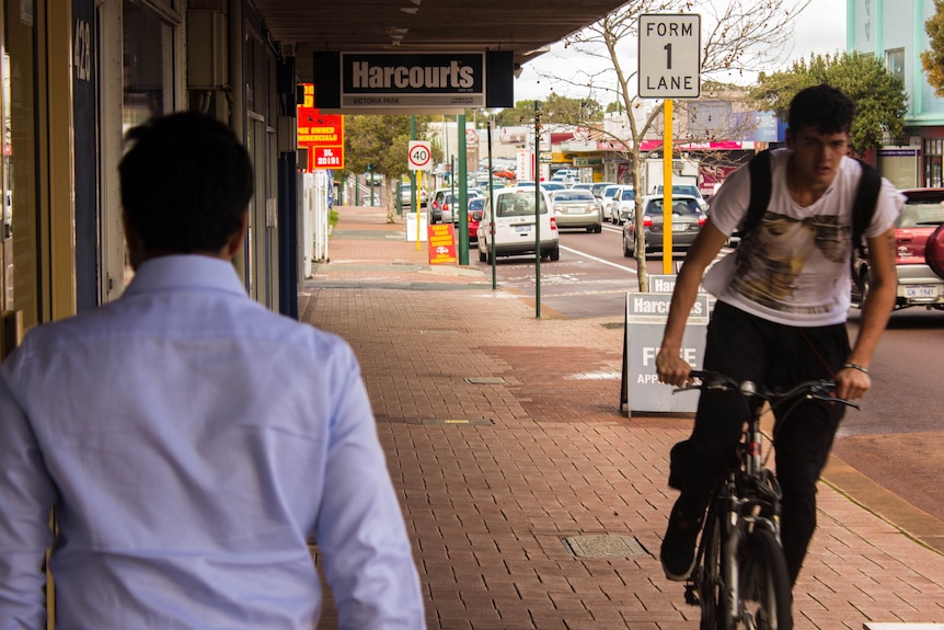 Albany Highway in Victoria Park with pedestrian and cyclist