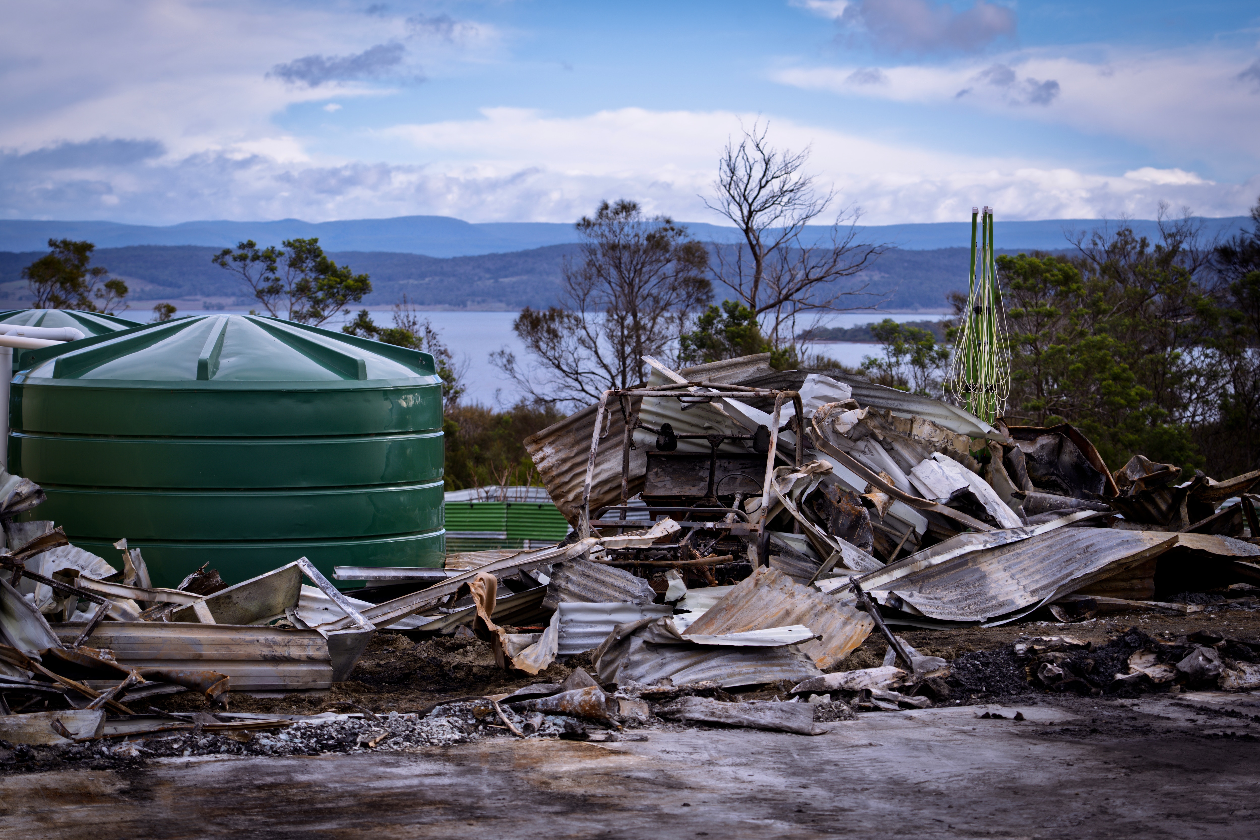View of a rural residence destroyed by fire.