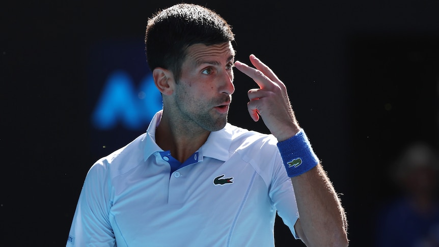 Novak Djokovic reacts during Australian Open semifinal loss to Jannik Sinner.