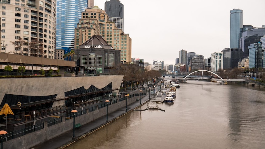 A photograph of a deserted Melbourne CBD with the Yarra River in view