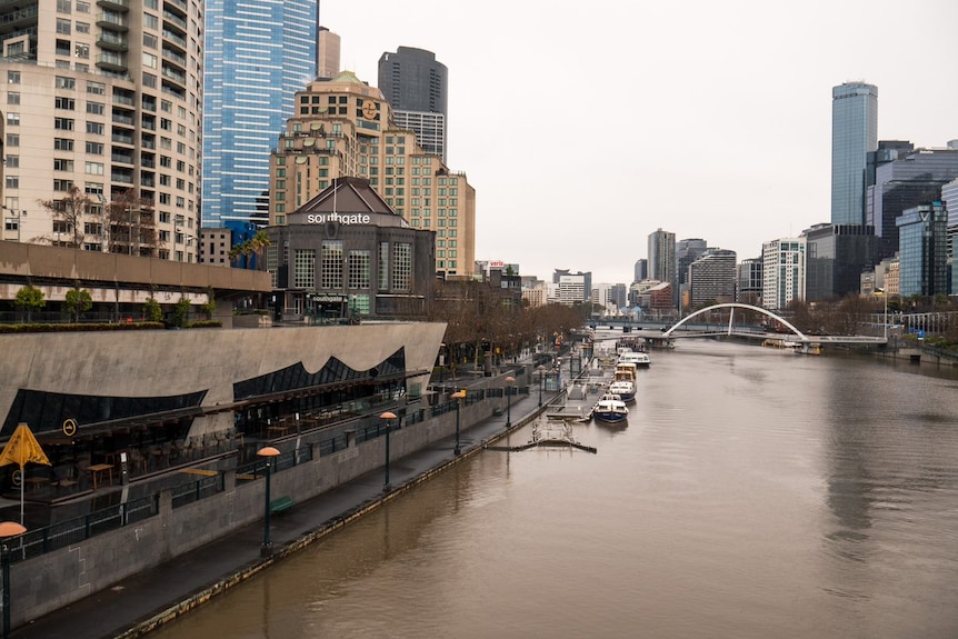 A photograph of a deserted Melbourne CBD with the Yarra River in view
