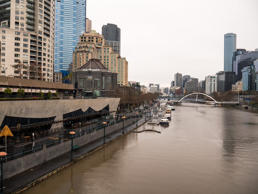 A photograph of a deserted Melbourne CBD with the Yarra River in view