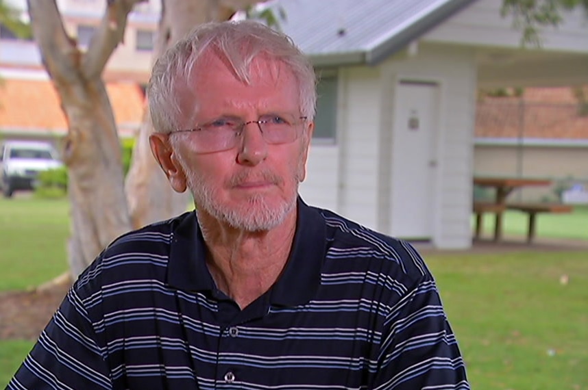 Ray Maxwell sits on a bench in a park in Hervey Bay