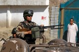 Afghan security forces arrive to the site of an insurgent attack in Kabul June 25, 2013.