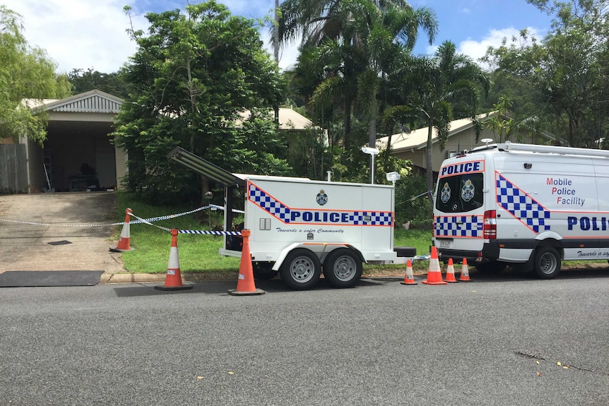 Police vehicles outside the unit where 32-year-old China Crawford was found dead at Bentley Park in Cairns on April 5, 2017