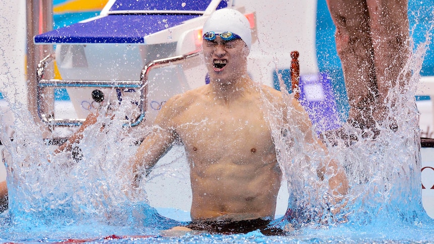 Record breaker ... China's Sun Yang celebrates winning the gold in the men's 1500m freestyle final.