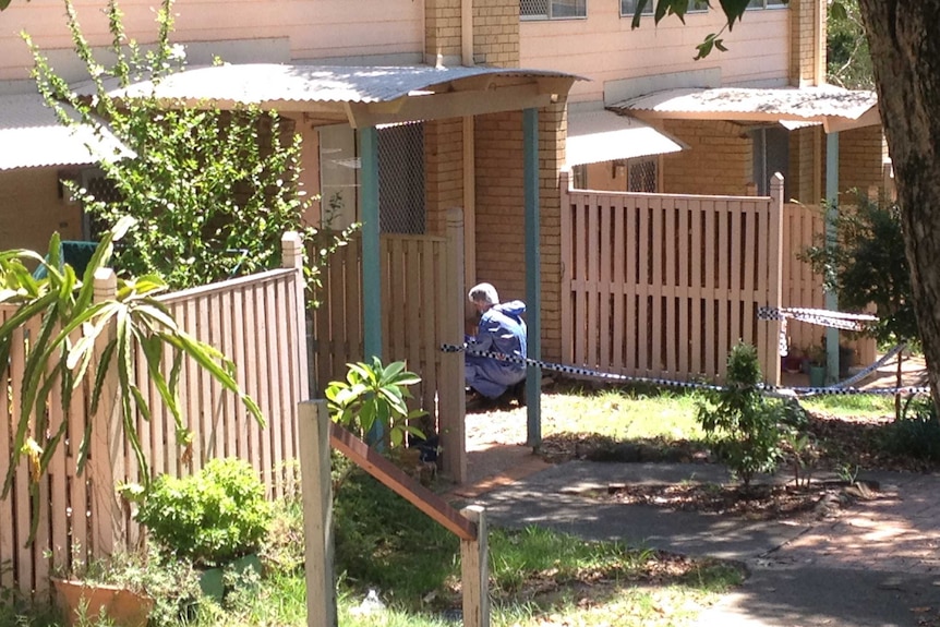 Forensic officer at a home in Wynnum West where 36 year old James Switez-Glowacz was found dead on February 8, 2018.