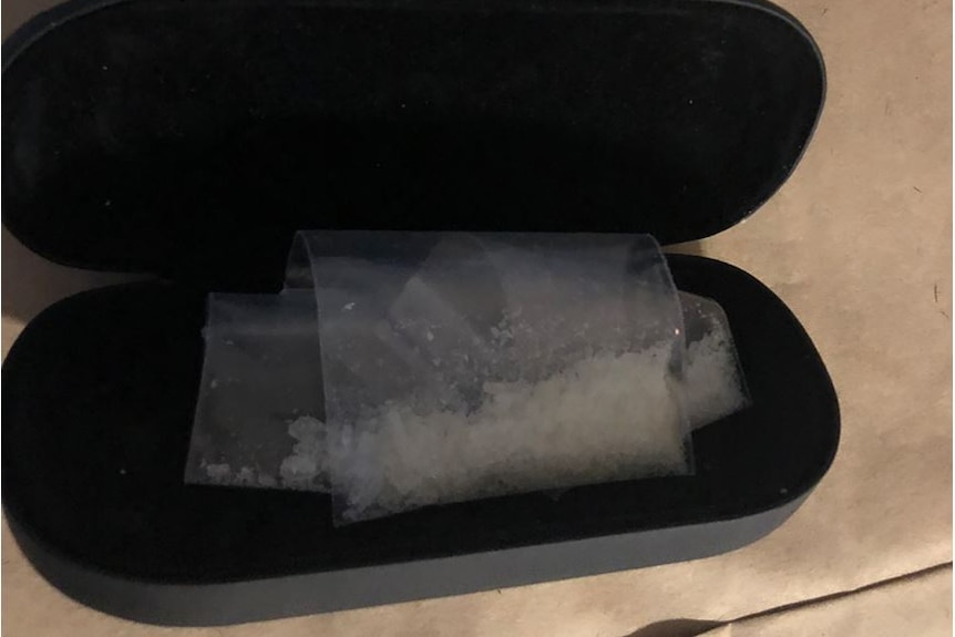 Bags of drugs in a sunglasses case.