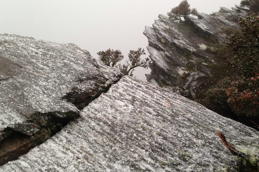 Snow on rocks on Bluff Knoll in WA's Stirling Ranges