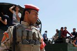 Iraqi soldier stands guard in Baghdad