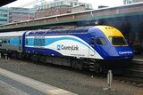 Engine and first two carriages of Countrylink train at Central Station in Sydney