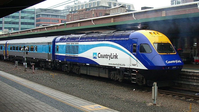 Engine and first two carriages of Countrylink train at Central Station in Sydney