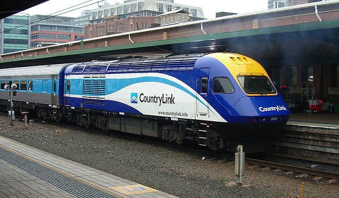 Engine and first two carriages of Countrylink train at Central Station in Sydney