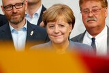 German Chancellor Angela Merkel reacts after winning the German general election.