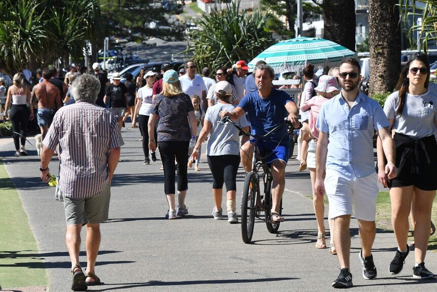 Crowd of people at Burleigh Heads on the Gold Coast, Sunday, May 3, 2020.