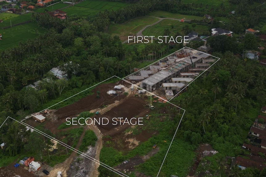 Aerial view of construction in Ubud jungle with graphics marking the first and second stage of development