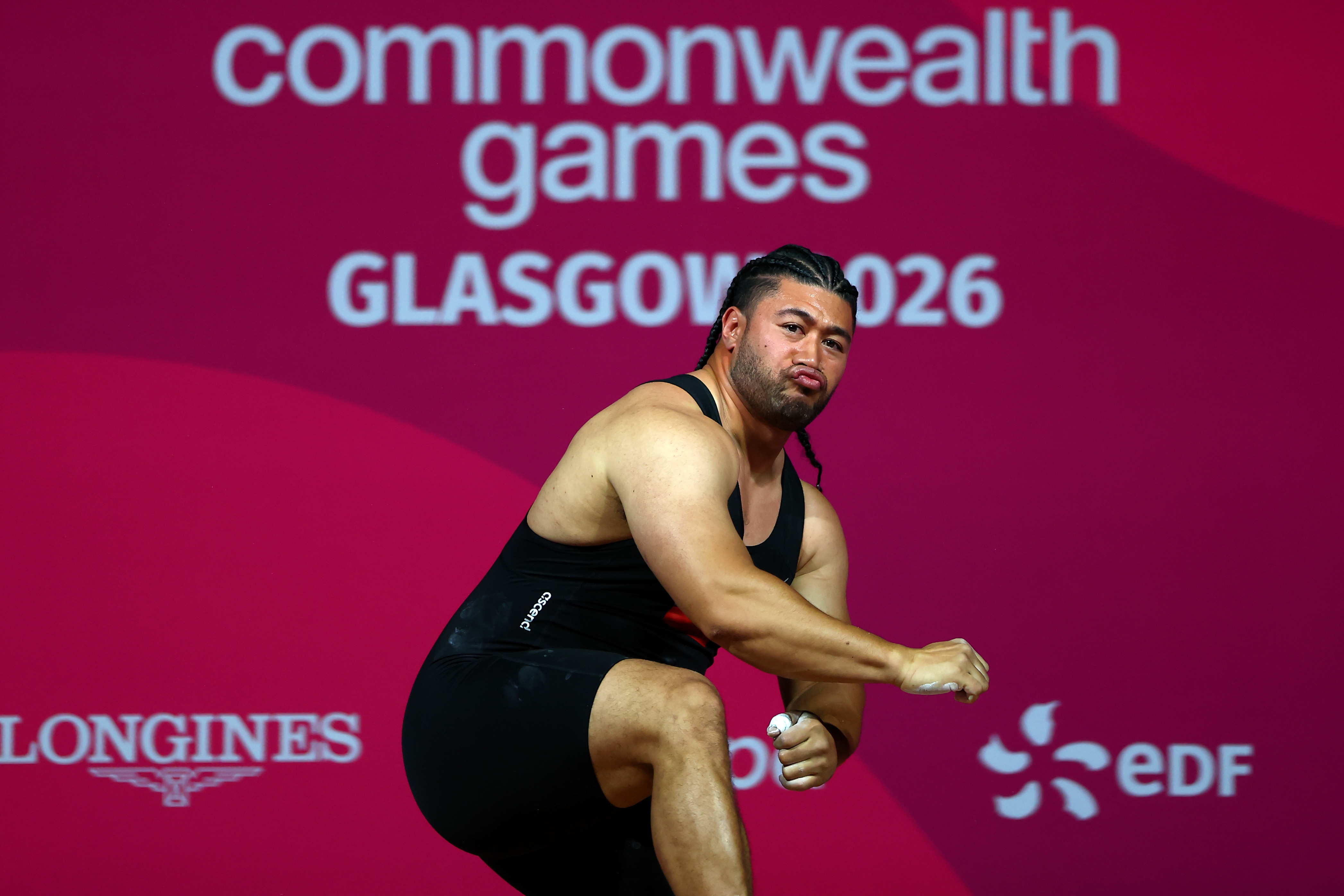 Tongan weightlifter Joshua Makafana Uikilifi celebrates at Commonwealth Games.