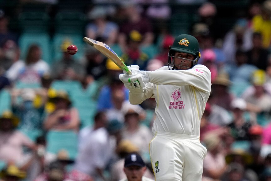 Australia batter Usman Khawaja plays a pull shot during an Ashes Test against England at the SCG.