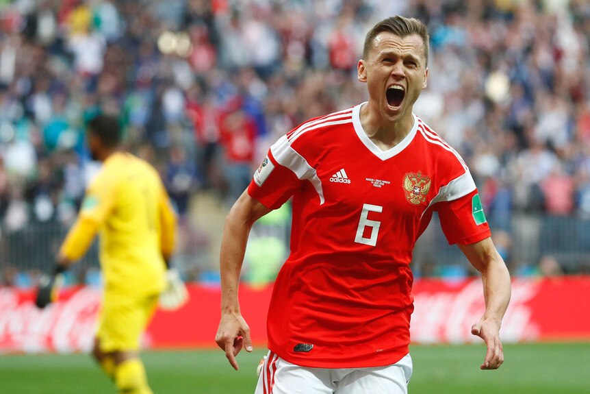 Denis Cheryshev celebrates scoring Russia's second goal against Saudi Arabia