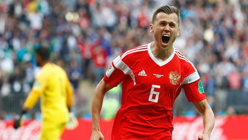 Denis Cheryshev celebrates scoring Russia's second goal against Saudi Arabia