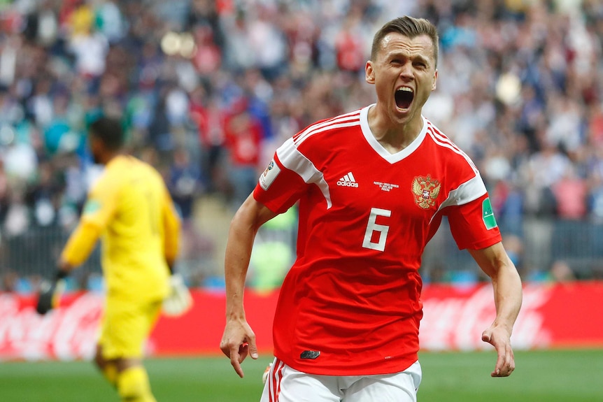 Denis Cheryshev celebrates scoring Russia's second goal against Saudi Arabia