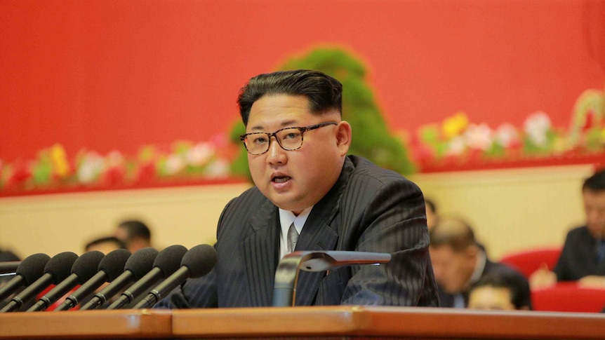 Kim Jong Un at the lectern.