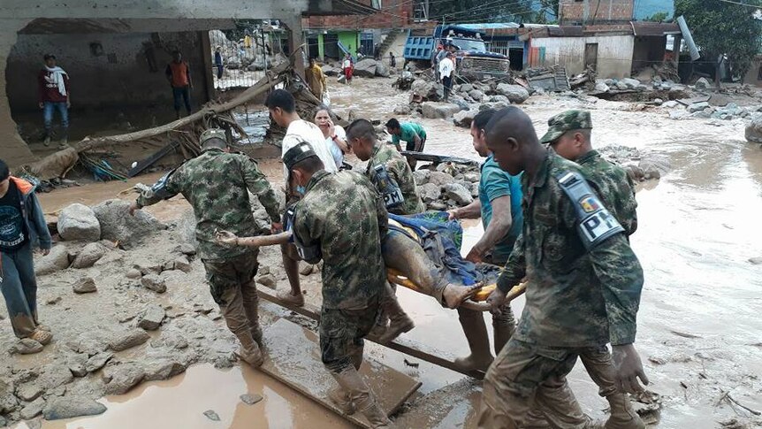 Colombian army personnel search for survivors, bodies after a deadly landslide in Mocoa