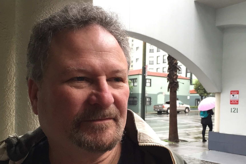 Don Rosenberg stands in the streets of San Francisco.