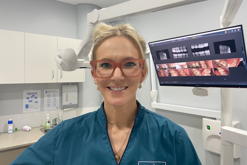 Dr Christine Farrelly smiles in treatment room