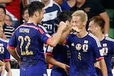 Japanese players celebrate a Keisuke Honda goal during the 2015 Asian Cup