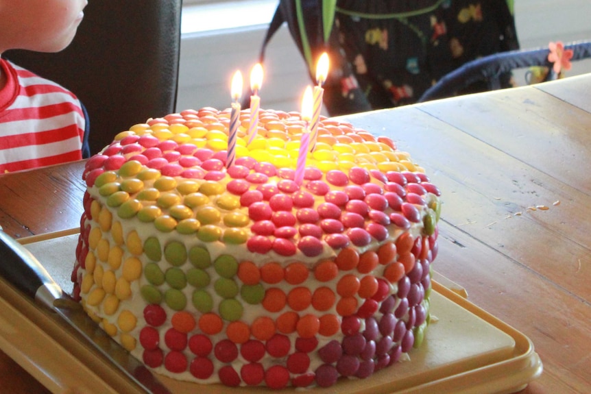A birthday cake decorated with smarties