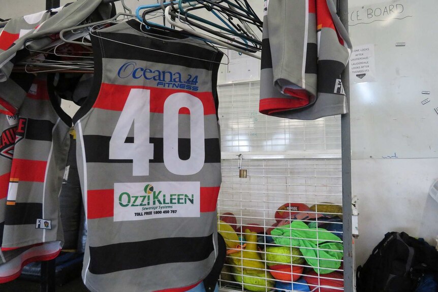 Lauderdale Football Club guernseys hang in the clubroom.