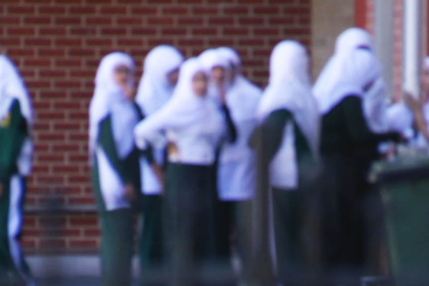 Islamic College students in grounds.