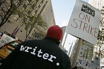 A writer joins other members of the Writers Guild of America on November 5, 2007, to picket the Rockefeller Centre, the headq...