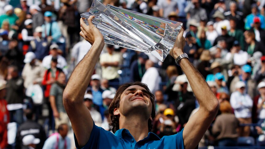 Red-hot form ... Roger Federer continued his winning run by lifting the Indian Wells trophy