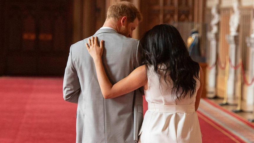 Prince Harry and Meghan, Duchess of Sussex, leaves after a photocall with their newborn son.