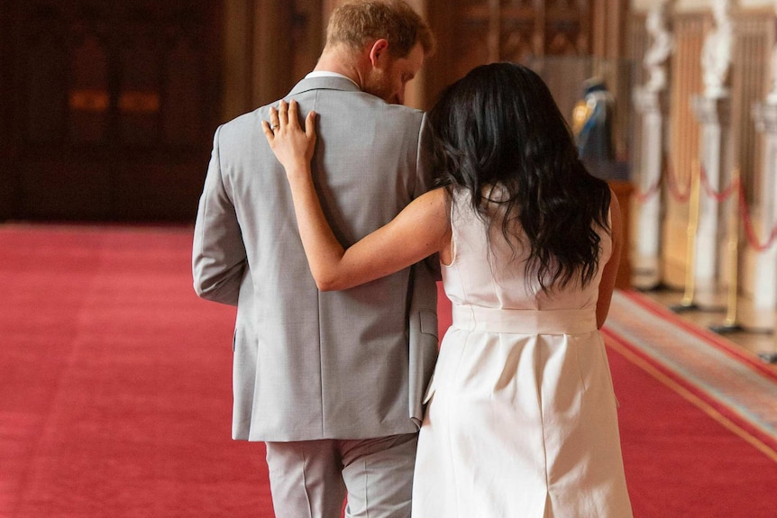 Prince Harry and Meghan, Duchess of Sussex, leaves after a photocall with their newborn son.