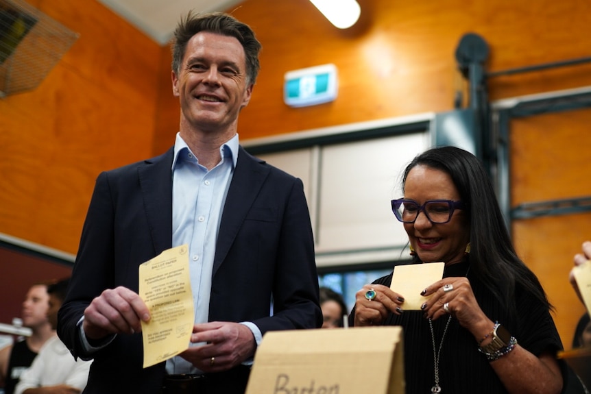 NSW Premier Chris Minns and Federal Minister for Indigenous Australians Linda Burney pictured at a Voice polling booth in Sydney