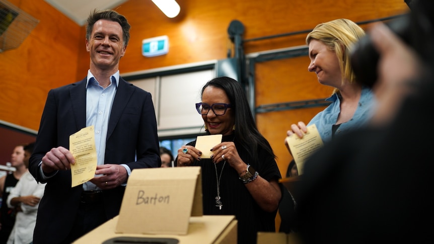 NSW Premier Chris Minns and Federal Minister for Indigenous Australians Linda Burney pictured at a Voice polling booth in Sydney