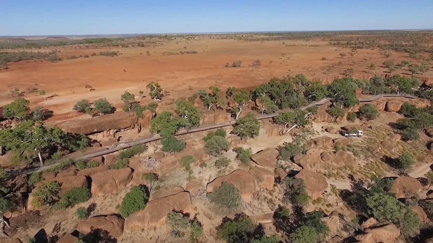 An aerial view of a walkway and desert around Winton.