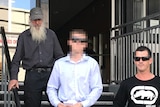 Shooting accused Nathan Richard Campbell leaves Launceston Magistrate's Court with two others.