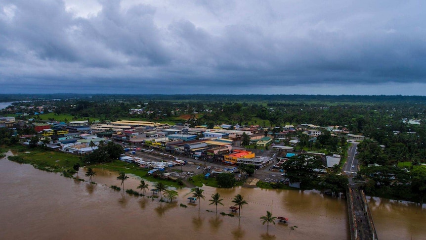 Aerial shot of a river that has burst its banks in Fiji.