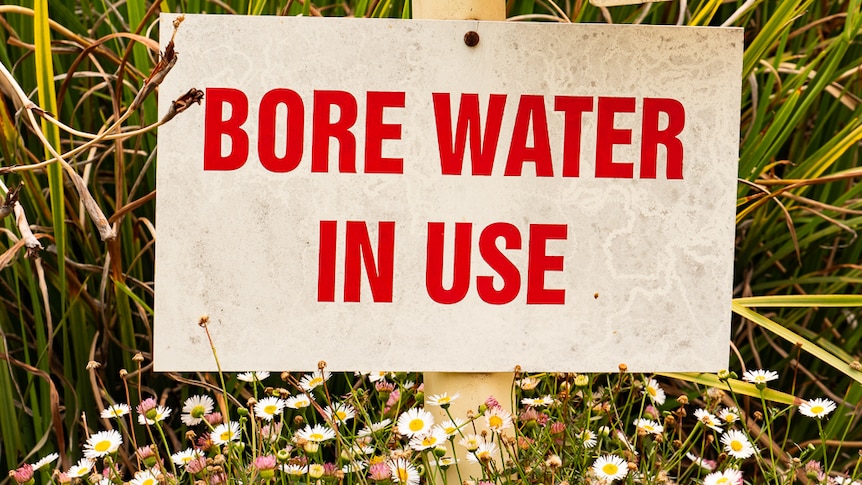 Bore water in use sign.