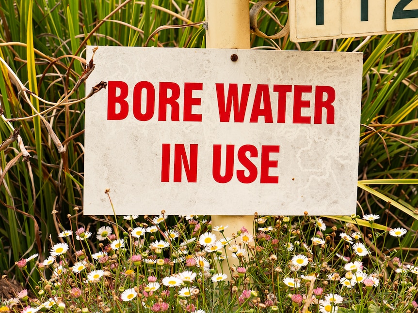 Bore water in use sign.