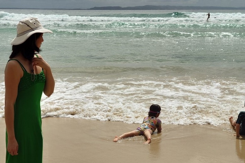 kids play on a beach