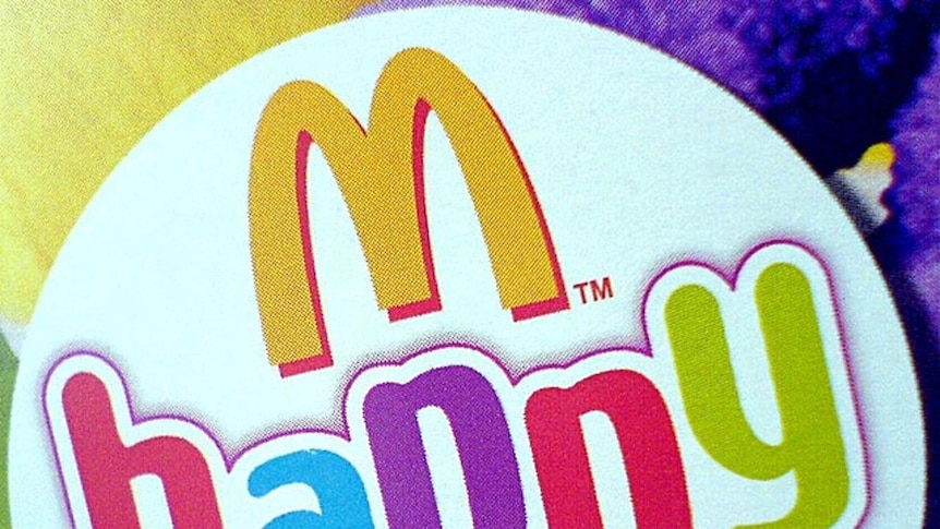 McDonalds Happy Meal logo on the side of a Happy Meal box